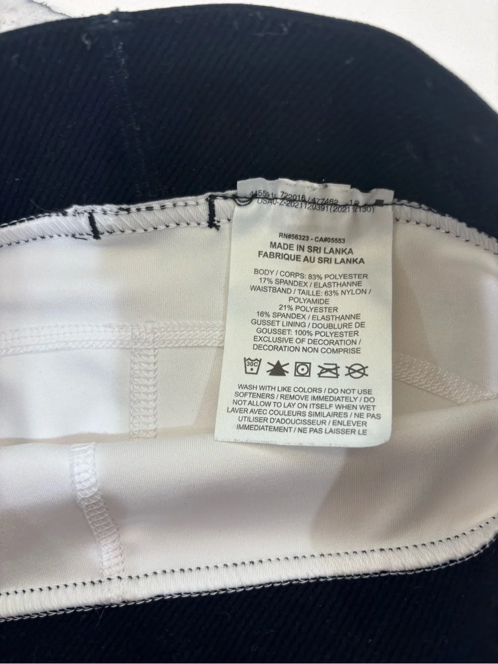 Nike Pro youth White Shorts with Black Waistband and Silver Logo